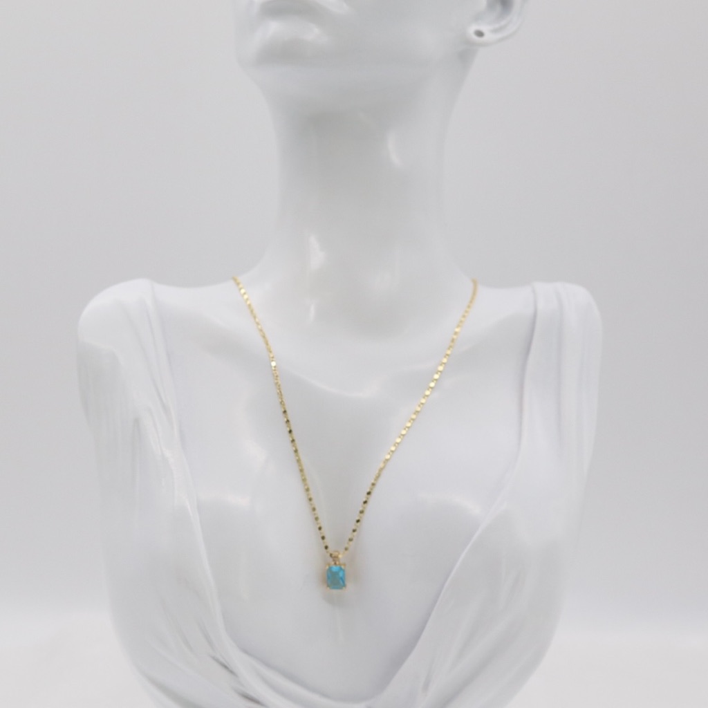 Gold Necklace With Rectangular Blue Gemstone Pendant